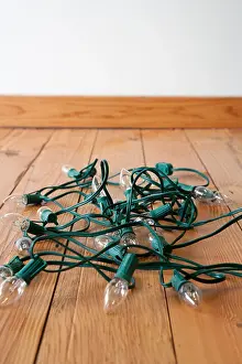 Adversity Prints: Christmas lights tangled on floor