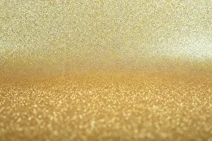 Christmas new year party background of gold light bokeh glitters