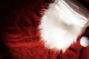 Woolen Prints: Christmas Santa Claus white furry beard on red fabric