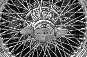 Wheel Prints: Chrome plated wire spoked wheel (right or off side) on a Jaguar