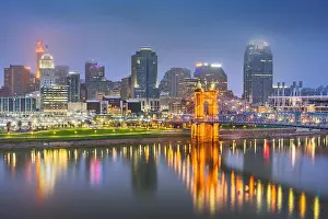 Cincinnati, Ohio, USA skyline on the river at night