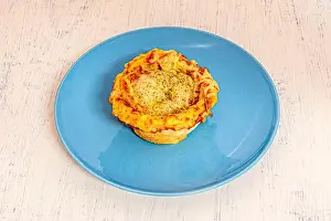 Cinnamon roll filled with Italian pizza ingredients
