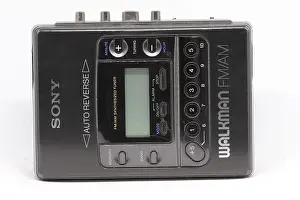 Sony Prints: Circa 1990 Sony Walkman cassette tape player with auto reverse and also AM FM radio