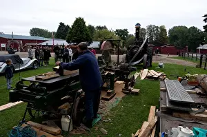 Circular saw, powered by a steam traction engine, cutting wood at Bressingham Steam Museum in Norfolk, England