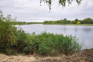 City Carnikava, Latvian Republic. Green nature in summer with River Gauja and waves. Travel photo. Sep 04. 2019