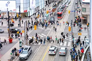 City life in the scrambled intersection in Yonge-Dundas Square, Toronto, Canada