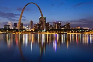 May Collection: City of St. Louis skyline. Image of St. Louis downtown with Gateway Arch at twilight