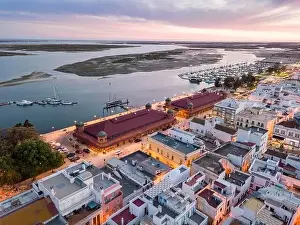 Atlantic Coast Prints: City view with two market buildings and and river Ria Formosa in the evening