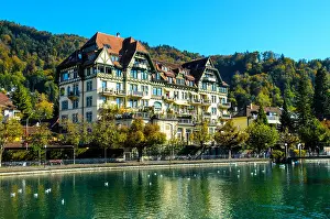 Bern Prints: City view of Thun, with old and historical houses next to river Aare