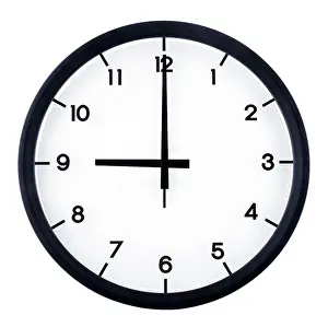 Analog Prints: Classic analog clock pointing at 9 o'clock, isolated on white background
