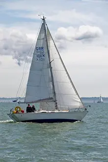 Yacht Racing Prints: A classic Twister Sailboat Quiet Lady competes in a yacht race during the Cowes Classic Week Regatta held off the coast