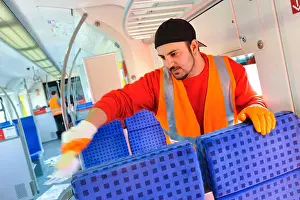 Refuse Prints: Cleaning personnel of the Deutsche Bahn during the daily cleaning of S-Bahn trains
