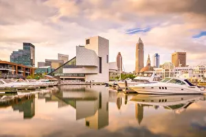 Cleveland, Ohio, USA downtown city skyline and harbor at twilight
