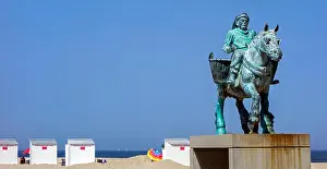 Fishermen Prints: Cloned Paardenvisser, bronze sculpture of shrimper on horseback on the beach at Oostduinkerke