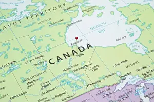 Latitude Prints: Close up to a Bird city with a red pin needle into Canada country political map