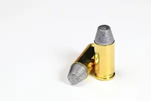 Violence Prints: close up bullet 9mm LSWC ( Lead Semi wadcutter ) with brass shell ready for use