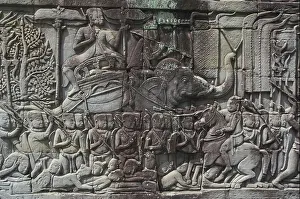 Khmer Prints: Close up of a frieze denoting a procession of figures with an elephant