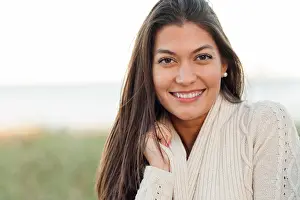 Gleeful Prints: Close up of Hispanic woman smiling