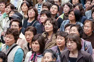 Entertaining Prints: Close up of large crowd of female Japanese visitors to the Nikko Tosho-gu Shinto Shrine UNESCO World Heritage Site