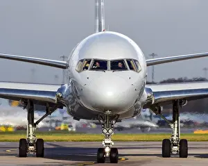 A close up Nose of the Boeing 757 with Pilots at the controls at Manchester Airport UK