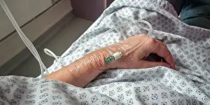 Urgency Prints: Close up on perfusion tube on a hand in an hospital