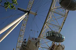 Tate Prints: Close up on a section of the main wheel and passenger cabins on the London Eye River Thames South Bank London UK