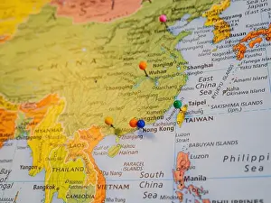Wyoming Prints: Close up shot of an international map focus on Asia with some pins at Wyoming