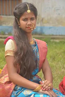 Teenage Girl Prints: Close up of a teenage Indian girls wearing sari