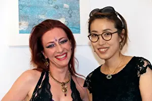 Close-up, of Belly Dancer and Artist Sara Paganetto with artist Luda Hong