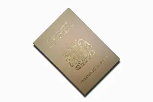 Passport Prints: Close-up on a British emergency passport isolated on a white background