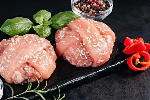 Chilled Prints: Close-up of two chicken hamburgers with basil leaves