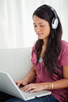 Knees Prints: Close-up of a Latino student using a laptop