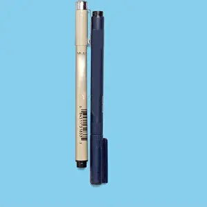 Drafting Prints: A close-up of two pens, one with a fine tip and the other a ballpoint