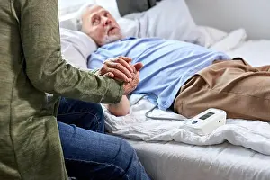 Medicament Prints: close-up photo of senior couple hands holding together
