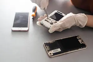 Screwdriver Prints: Close-up photos showing process of mobile phone repair