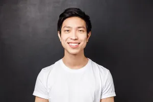 Charismatic Prints: Close-up portrait of satisfied asian client smiling pleased