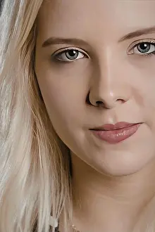 Blue Hair Prints: A close-up portrait of a young woman with blonde hair