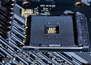Computer Hardware Prints: A close-up view of an AM4 CPU socket on a motherboard