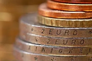 Return Prints: Close-up view on a stack of euro coins