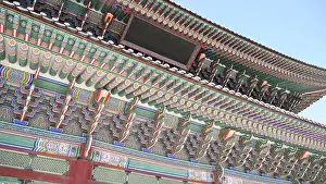 Ornaments Prints: close up view on colorful roof of traditional building in korea