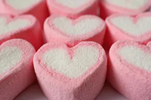 Heart Shaped Prints: Closed Up Texture of Pastel Pink and White Heart Shaped Marshmallow Candies