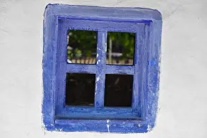City Prints: Closed vintage blue window on white wall of old house in romania