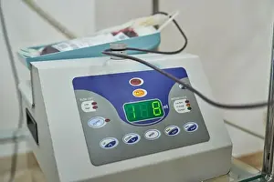 Indicating Prints: Closeup of blood collection mixer machine indicating volume of donor blood in medical laboratory