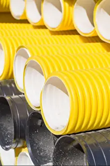 White Work Prints: Closeup on corrugated PVC pipes