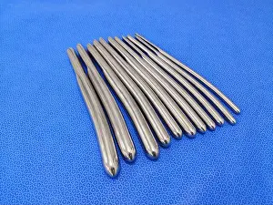 Examine Prints: Closeup Image of Medical Surgical Single End Urethral Dilator Set In Different Size Using For Medical Examination &