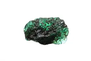 Emerald Prints: Closeup natural rough emerald (green beryl) gemstone on biotite matrix