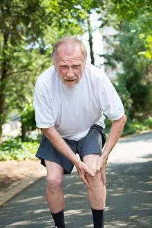 Knee Prints: Closeup portrait, older man in white shirt