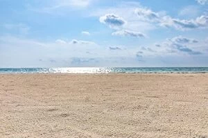 Images Dated 22nd May 2019: Closeup of sand on beach and blue summer sky. Panoramic beach landscape
