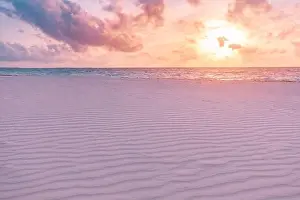 Closeup sea sand beach. Panoramic beach landscape. Inspire tropical beach seascape horizon. Orange and golden sunset sky calmness tranquil relaxing