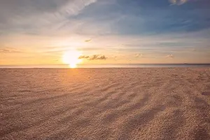 Closeup sea sand beach. Panoramic beach landscape. Inspire tropical beach seascape horizon. Orange and golden sunset sky calmness tranquil relaxing